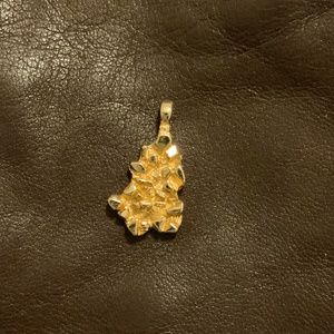 Gold color asymmetrical charm